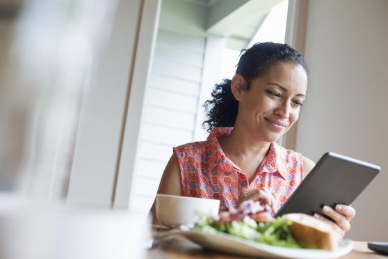 woman working on iPad